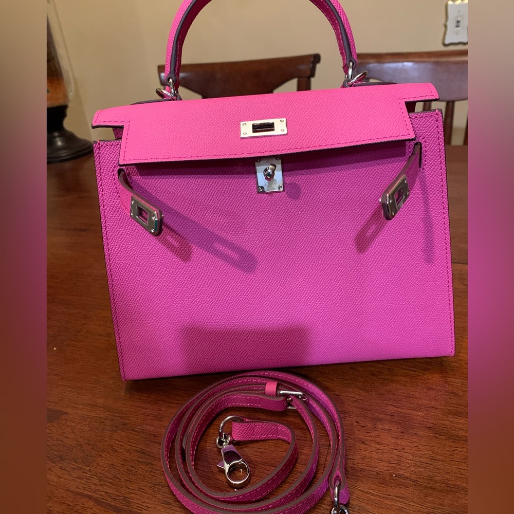 Brand new Absolutely stunning fuchsia real leather trendy purse size 25 w/ strap